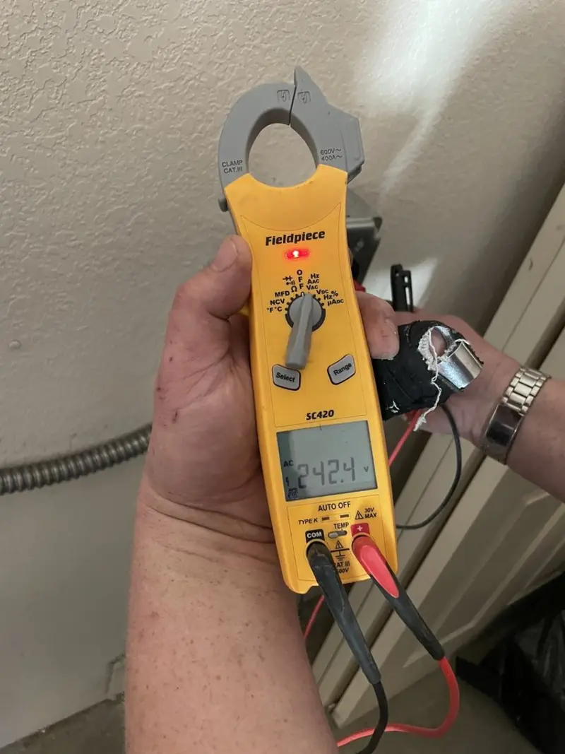 Voltage testing with clamp meter during Aluminum Wiring Replacement in Mount Pleasant